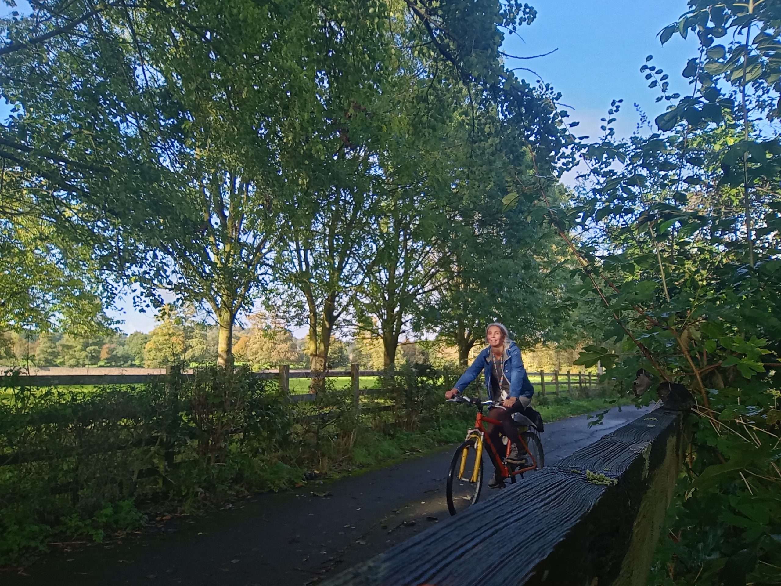 Hannah riding her bicycle